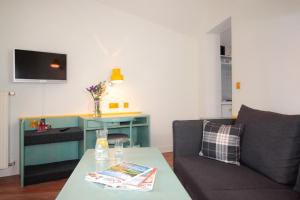 TV a/nebo společenská místnost v ubytování Hotel-Gasthof zum Bach