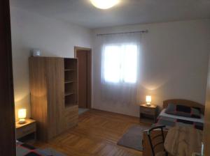 Postel nebo postele na pokoji v ubytování Large Apartment Duje