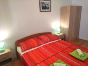 Postel nebo postele na pokoji v ubytování Large Apartment Duje