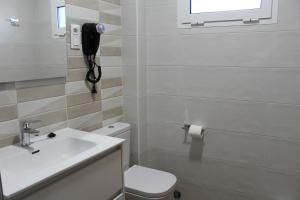 Kúpeľňa v ubytovaní Pensión Albergue O Pedregal