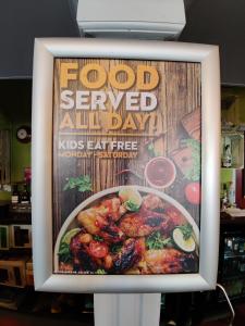 a sign that says food served all day with chicken at Woolpack Inn in Chichester