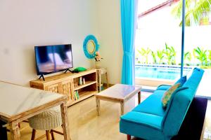 TV/Unterhaltungsangebot in der Unterkunft Ocean Star Apartment Sanur
