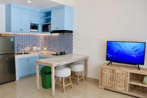 Küche/Küchenzeile in der Unterkunft Ocean Star Apartment Sanur