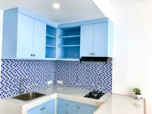 Küche/Küchenzeile in der Unterkunft Ocean Star Apartment Sanur
