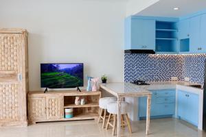 Küche/Küchenzeile in der Unterkunft Ocean Star Apartment Sanur