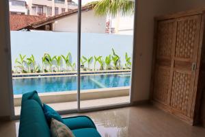 Der Swimmingpool an oder in der Nähe von Ocean Star Apartment Sanur