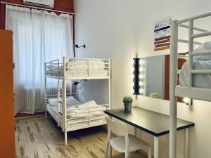 A bed or beds in a room at QUO Milano