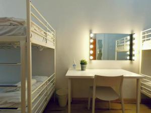 A bed or beds in a room at QUO Milano
