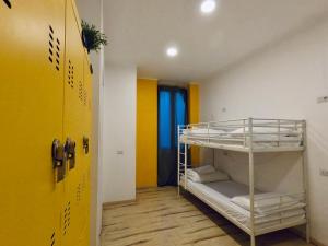 A bed or beds in a room at QUO Milano
