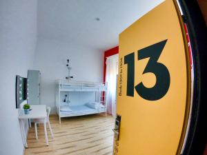 A bed or beds in a room at QUO Milano