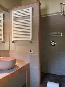 a bathroom with a sink and a shower at Florence Country Relais in Fiesole