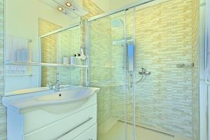 Kúpeľňa v ubytovaní Villa Larisa
