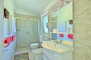 Kúpeľňa v ubytovaní Villa Larisa