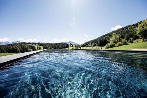The swimming pool at or close to Green Luxury Hotel Pfösl