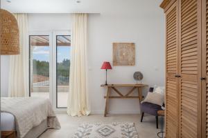 Posteľ alebo postele v izbe v ubytovaní Luxury Villa Vespera