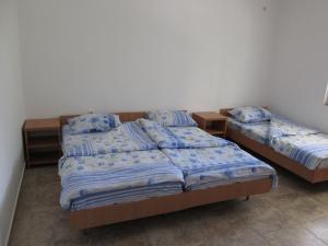 Postel nebo postele na pokoji v ubytování Guest House Sandra