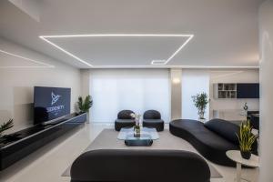 TV a/nebo společenská místnost v ubytování Serenity Penthouse