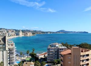 a view of the ocean from a city at Calpe Beachview in Calpe
