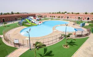 an overhead view of a swimming pool at a resort at Hotel & Resort Golden Marina Yanbu in Yanbu