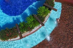 A piscina localizada em HotSprings OFICIAL B3 Hotéis ou nos arredores
