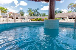 A piscina localizada em HotSprings OFICIAL B3 Hotéis ou nos arredores