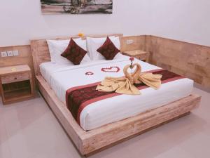 Letto o letti in una camera di Pulu Sari Suite Ubud