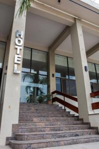 a building with stairs in front of it at Catalina Hotel San Pedro de Jujuy in San Pedro de Jujuy