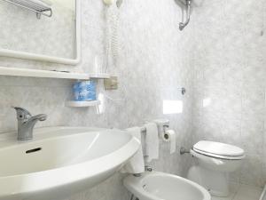 Koupelna v ubytování Hotel Reginella