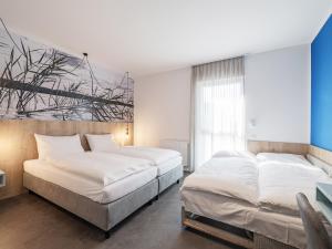 Postel nebo postele na pokoji v ubytování Lakeside77
