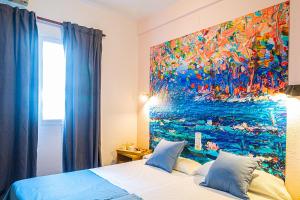 Postel nebo postele na pokoji v ubytování Hotel Internacional