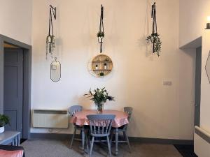 a dining room with a table and chairs at The Sheriffs Lodge in Dingwall