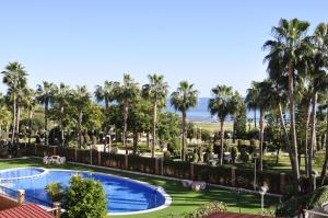 Πισίνα στο ή κοντά στο APCOSTAS Marina D'or 1era línea - vista lateral mar