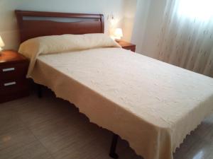 Postel nebo postele na pokoji v ubytování APCOSTAS Marina D'or 2da Línea