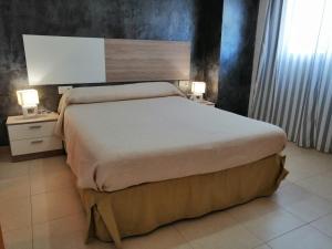 Postel nebo postele na pokoji v ubytování APCOSTAS Marina D'or 2da Línea