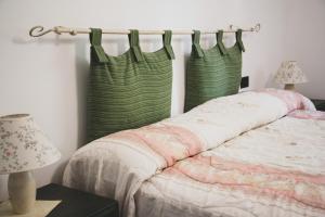 A bed or beds in a room at Agriturismo Monte della Dea