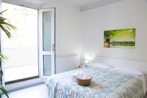 Katil atau katil-katil dalam bilik di Guest House Oasi Dei Mille