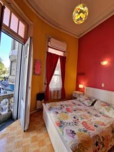 Ένα ή περισσότερα κρεβάτια σε δωμάτιο στο Hostel Estoril