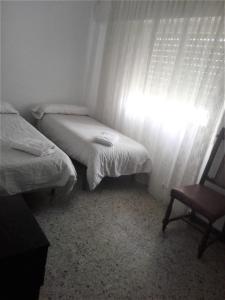 En eller flere senger på et rom på ANSELMO CLAVÉ