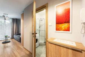 Kúpeľňa v ubytovaní Waw Apartamenty Manhattan