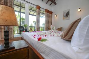 Una cama o camas en una habitación de L&D Stay Inn