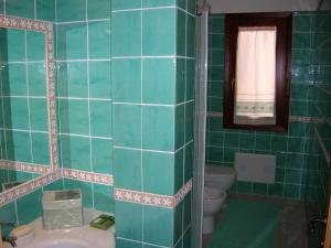 A bathroom at Appartamento nel cuore di Villasimius 1 piano
