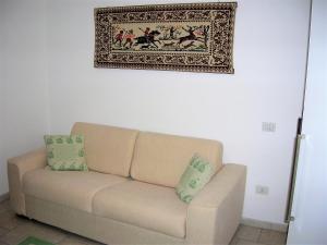 A seating area at Appartamento nel cuore di Villasimius 1 piano