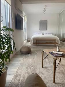 Postel nebo postele na pokoji v ubytování Shi Ti Junior Suite + 10 fotografií