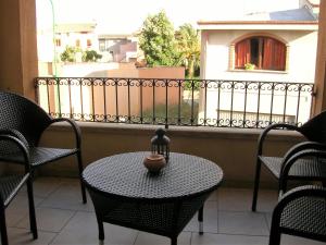 A balcony or terrace at Appartamento nel cuore di Villasimius 1 piano