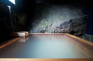 Bazén v ubytování Onsen Guesthouse HAKONE TENT nebo v jeho okolí