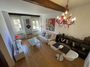 an overhead view of a living room with a chandelier at Sagasta Centro in Logroño