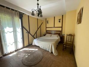 Postel nebo postele na pokoji v ubytování Hotel Casa Beletri
