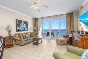 a living room with a couch and a table at San Carlos Unit 607 in Gulf Shores