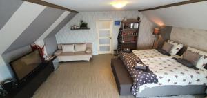Katil atau katil-katil dalam bilik di Bed & Breakfast Ravelin
