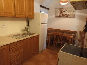 Kuchyň nebo kuchyňský kout v ubytování Statek Straňovice Apartmán 2 velký